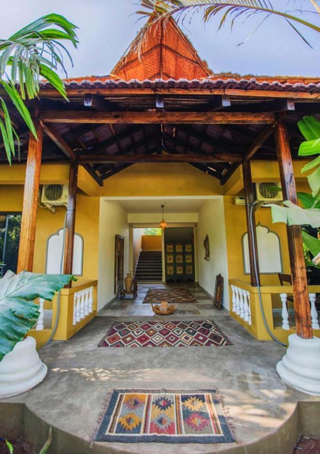 Devarya Wellness Beach Resort Morjim Bagian luar foto