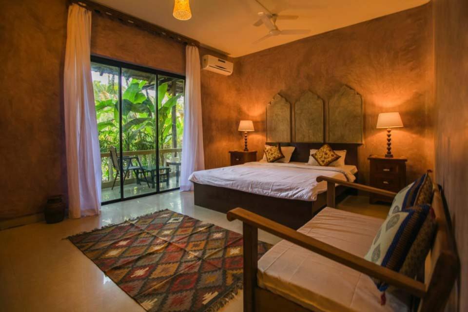 Devarya Wellness Beach Resort Morjim Bagian luar foto