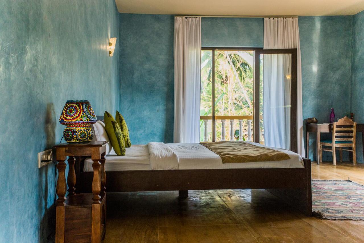 Devarya Wellness Beach Resort Morjim Bagian luar foto