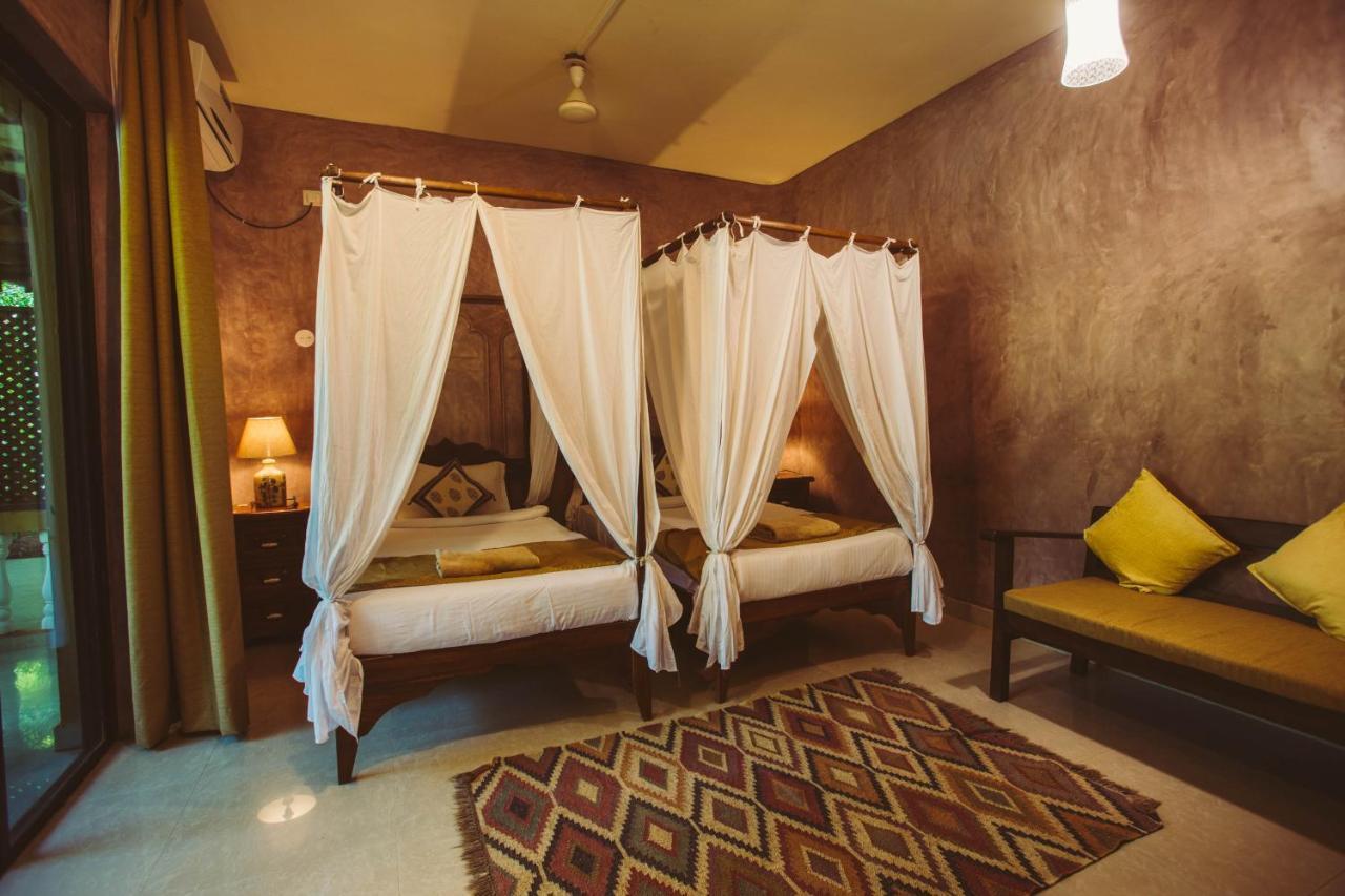 Devarya Wellness Beach Resort Morjim Bagian luar foto