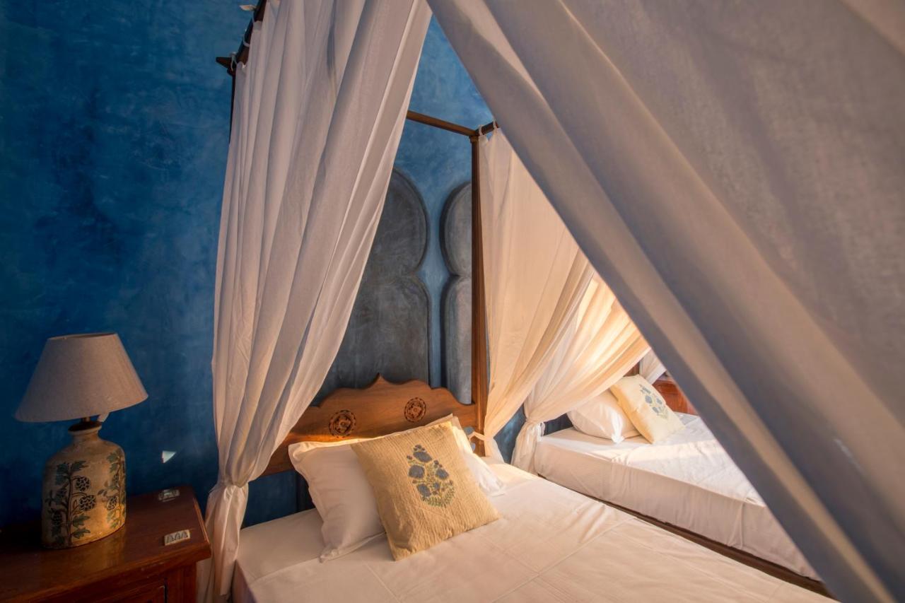 Devarya Wellness Beach Resort Morjim Bagian luar foto