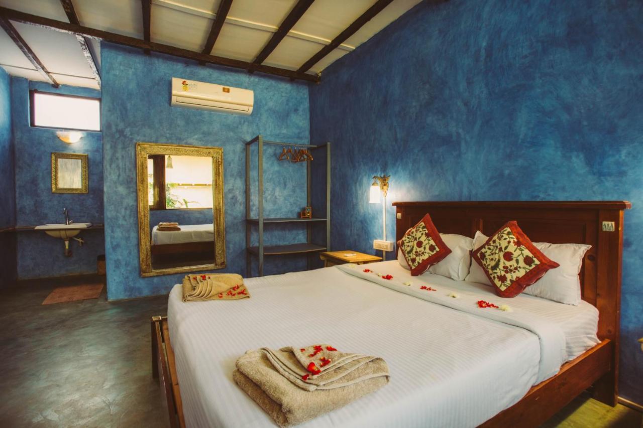 Devarya Wellness Beach Resort Morjim Bagian luar foto