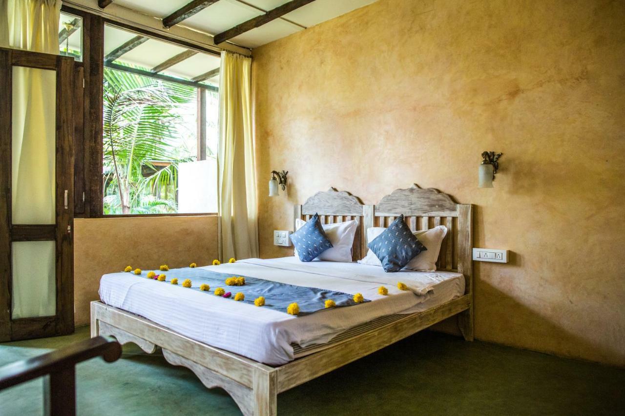 Devarya Wellness Beach Resort Morjim Ruang foto