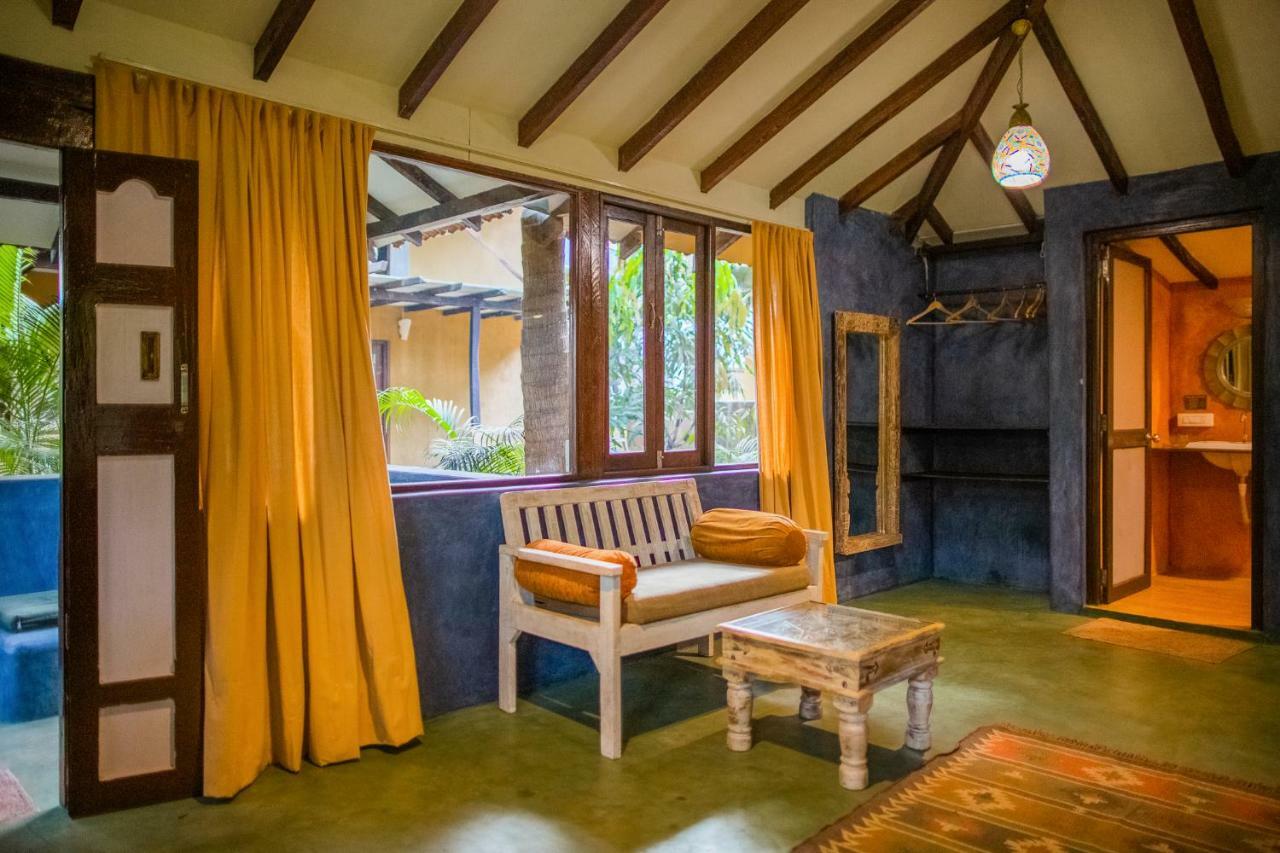 Devarya Wellness Beach Resort Morjim Bagian luar foto