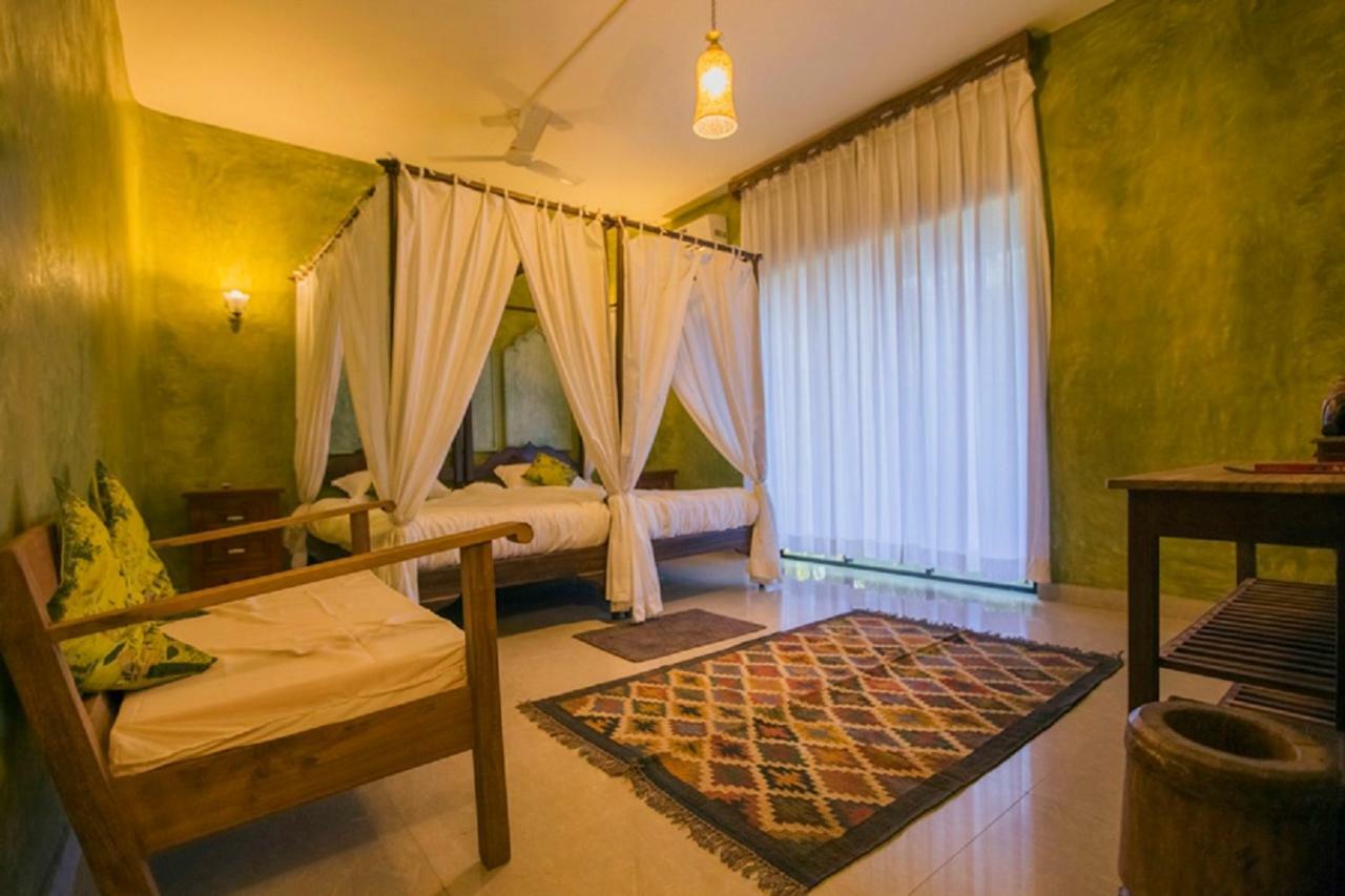 Devarya Wellness Beach Resort Morjim Bagian luar foto
